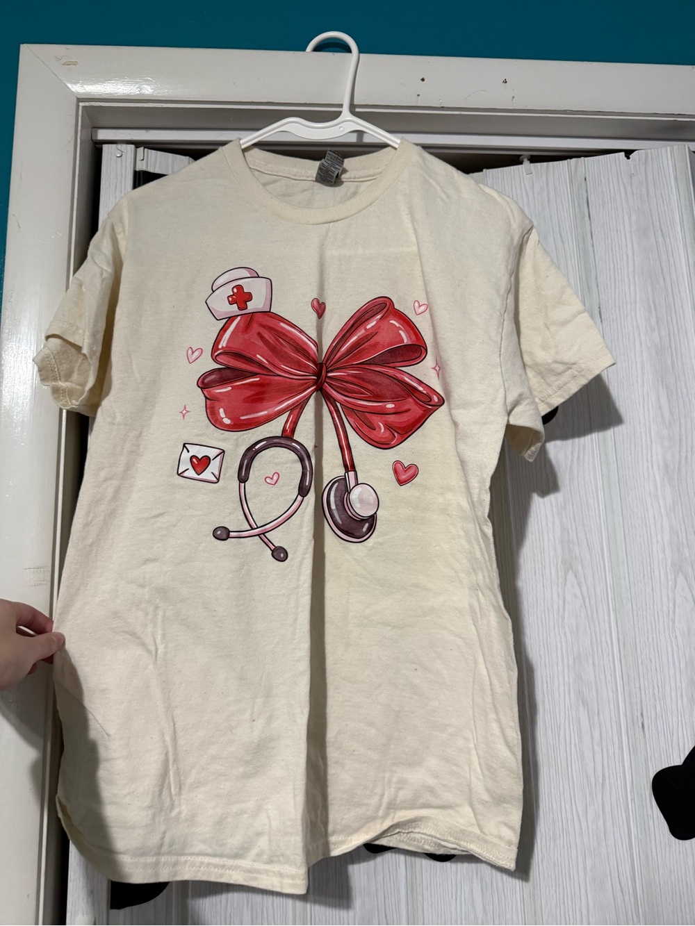 Cream Nurse Graphic Tee with Red Bow